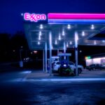 cars parked in front of UNKs store during night time