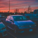 a couple of cars parked in a parking lot