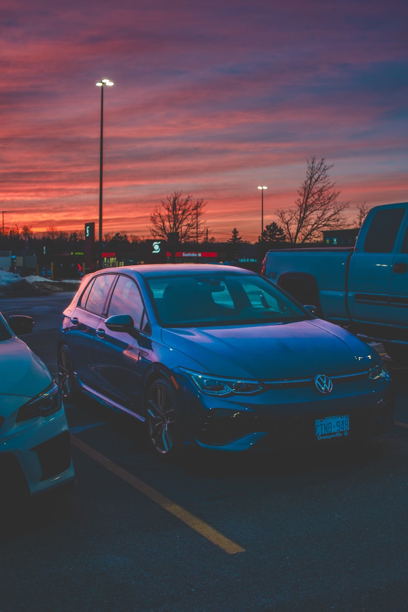 a couple of cars parked in a parking lot